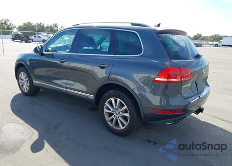 2014 Volkswagen Touareg 3.6L Sport from USA, damaged, VIN WVGEF9BP3ED006664